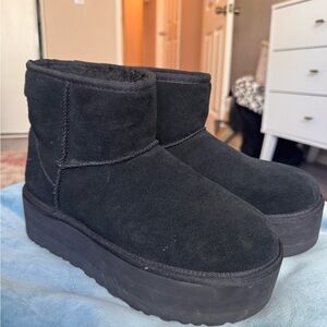 Ugg black platform booty, size 8, like new.